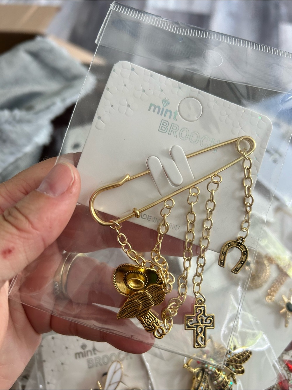 4/$50 Mint Gold-tone Charm Safety Pin Brooch with Cross, Horseshoe & Cowboy Hat